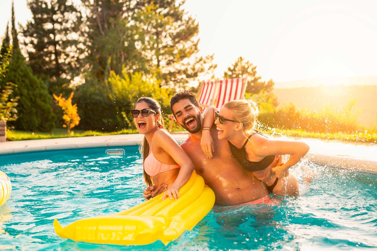 friends-having-fun-at-the-swimming-pool-2023-11-27-05-23-21-utc.jpg